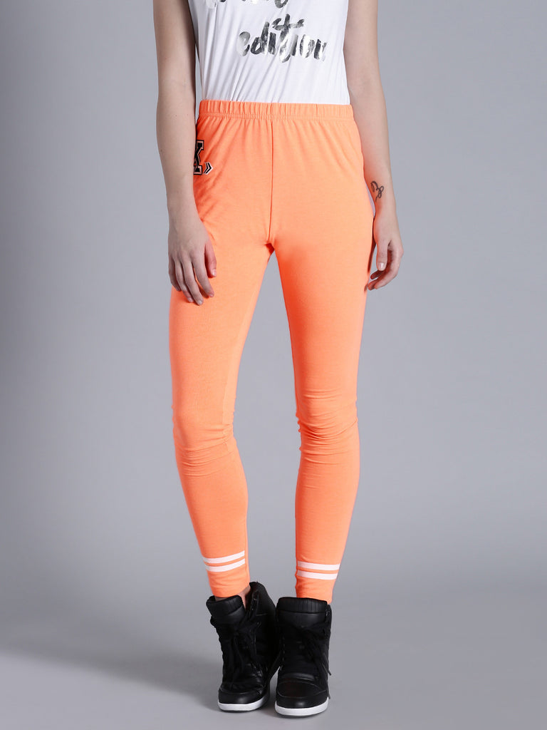 Huggy Women Orange Solid Ankle-Length Leggings (M) - Yavonne