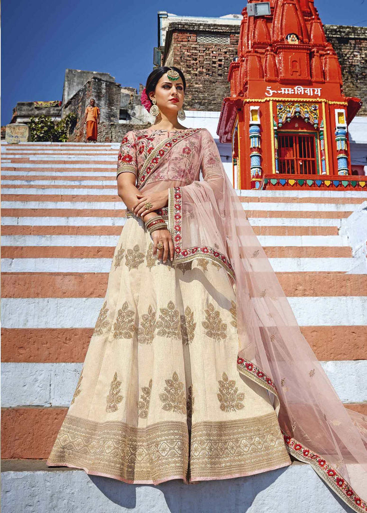 Magnetic Cream Colored Wedding Wear Embroidered Silk Lehenga Choli, शादी का  लहंगा - Maia Nava, Bengaluru | ID: 2851808924733